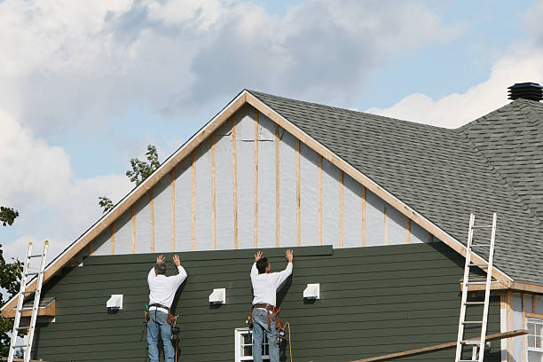 Professional Siding Installation technician working in Goshen, IN